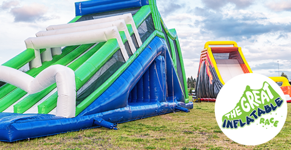 inflatable slides blown up in field
