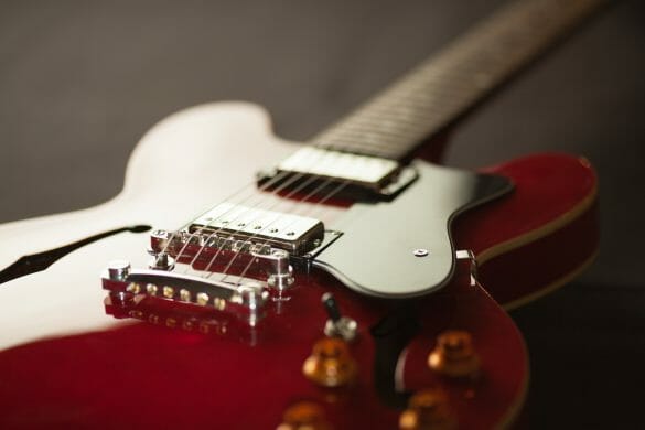 Close up of red guitar