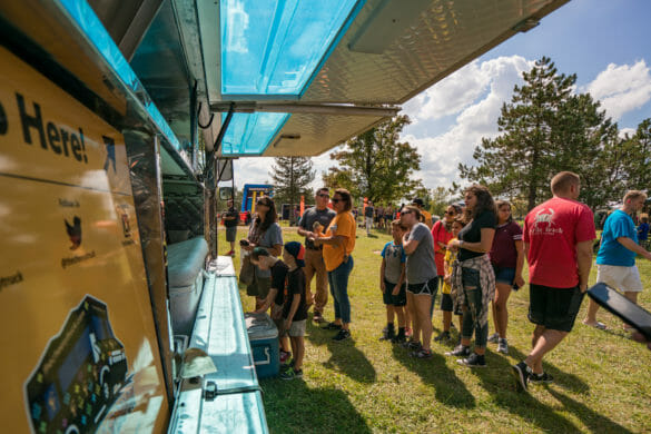 people in front of food truck
