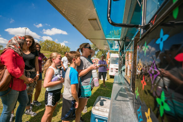 People in front of food truck