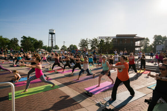 Women doing yoga at Hilliard's Station Park