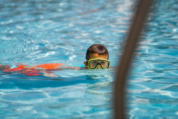 Boy swimming in a pool