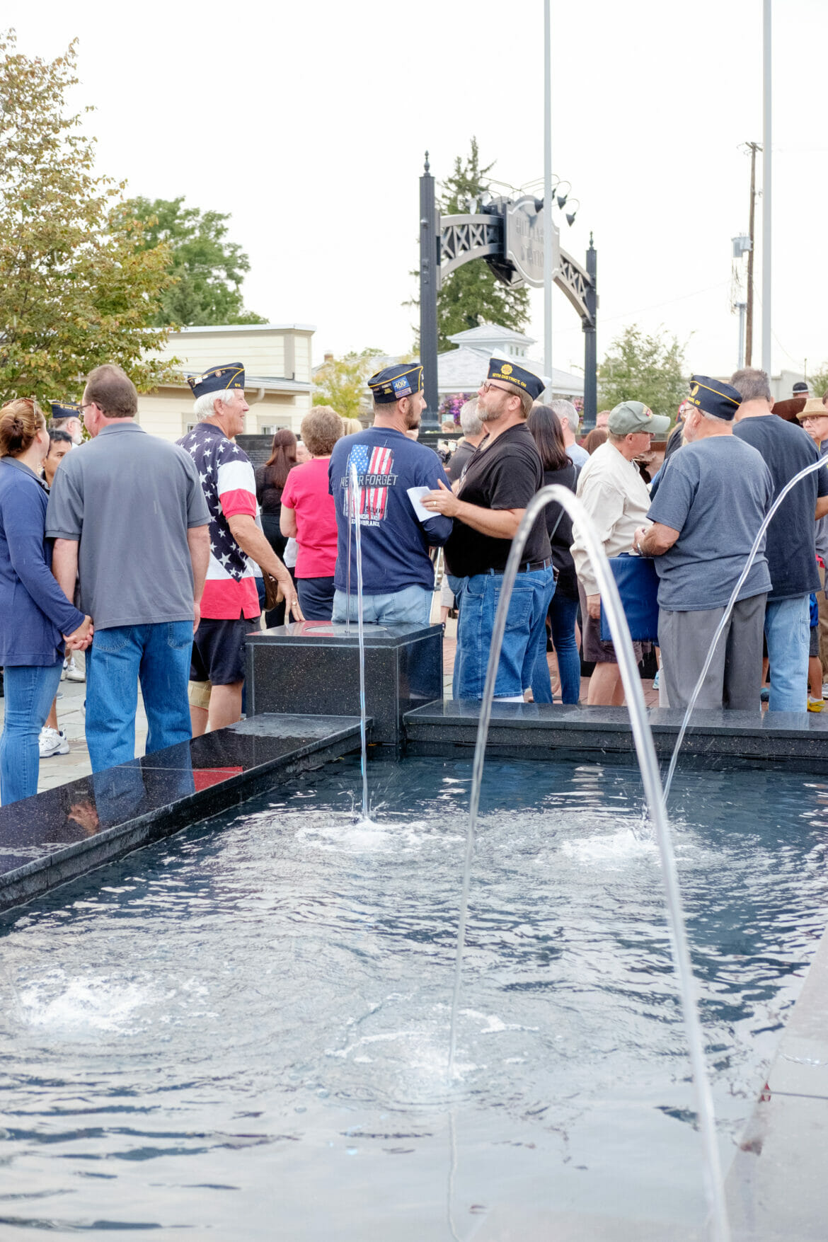 Residents in front of fountain at First Responders Park