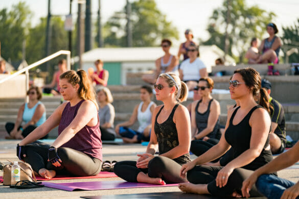 women outside, waiting to begin yoga