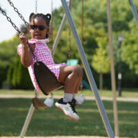 A little girl swinging