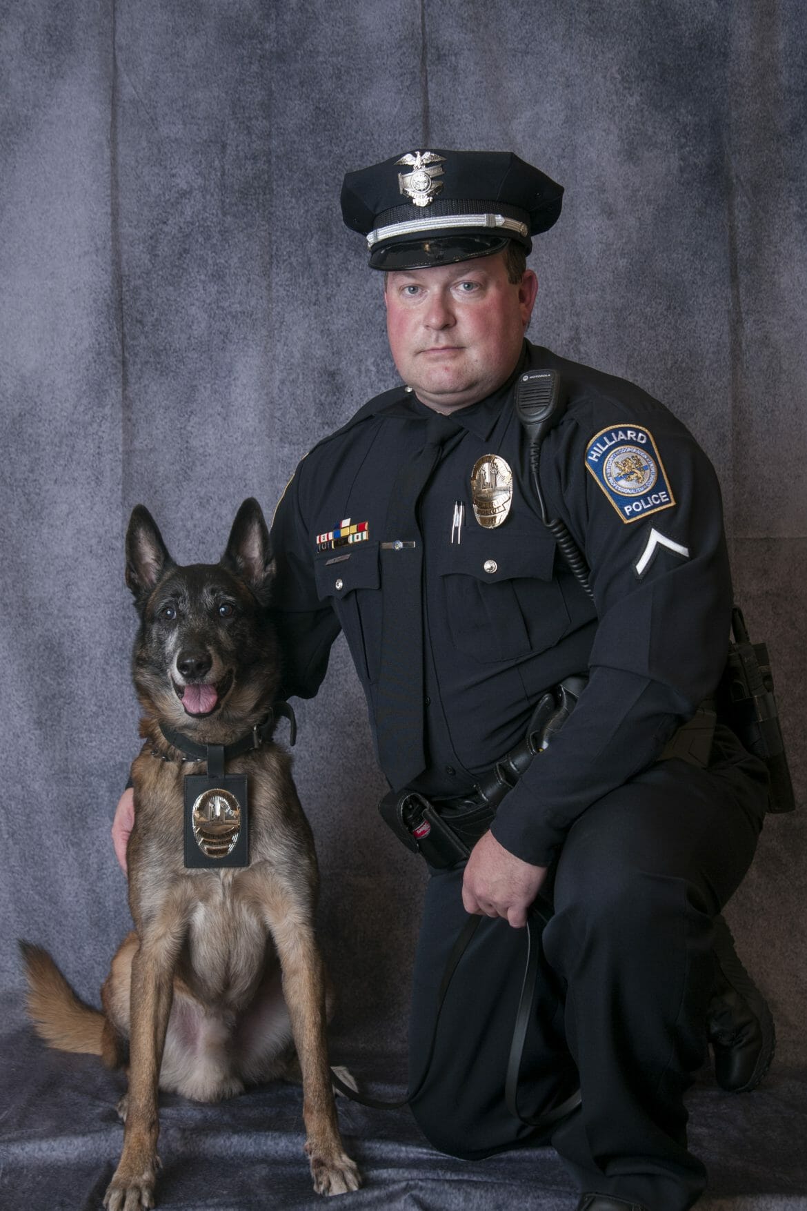 Officer Large and k9 Oz official portrait