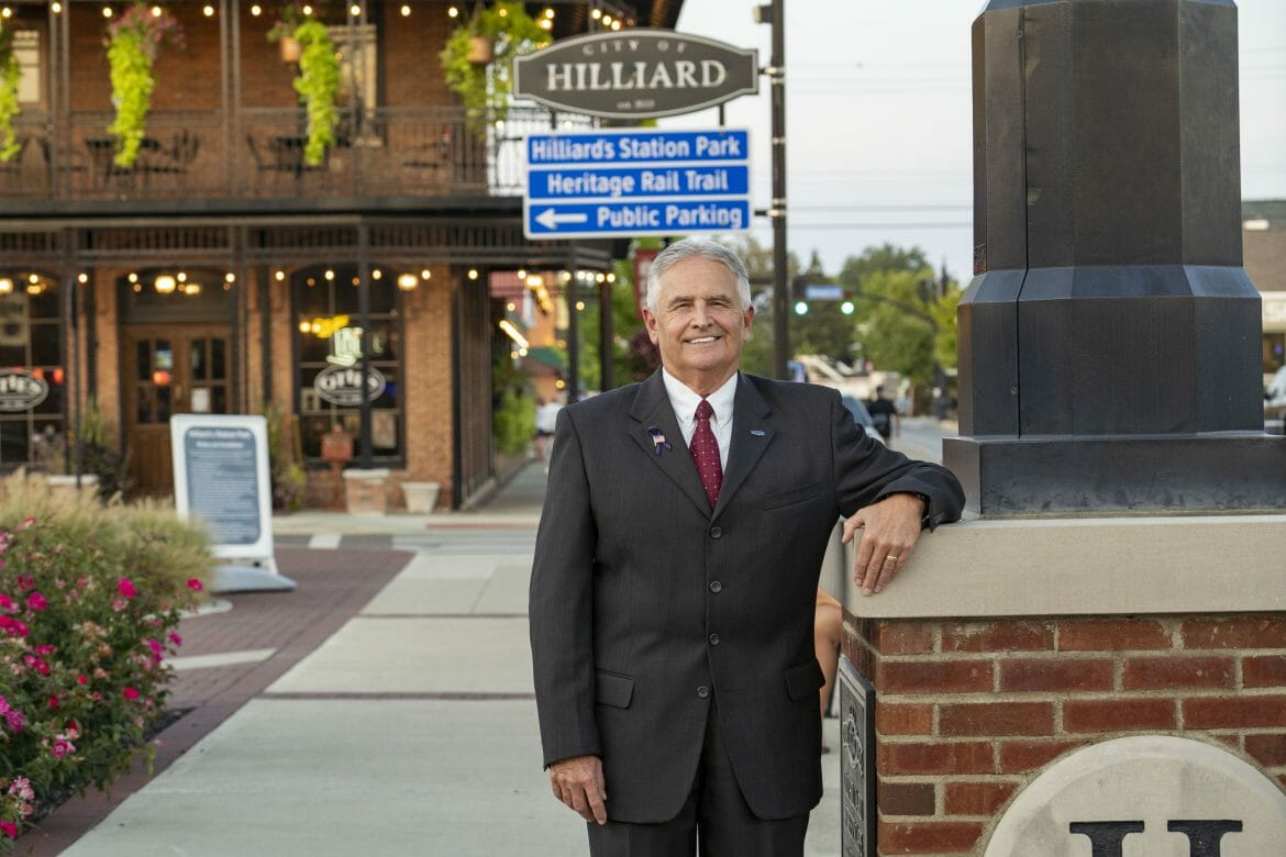 Mayor Don Schonhardt standing in front of Otie's Tavern