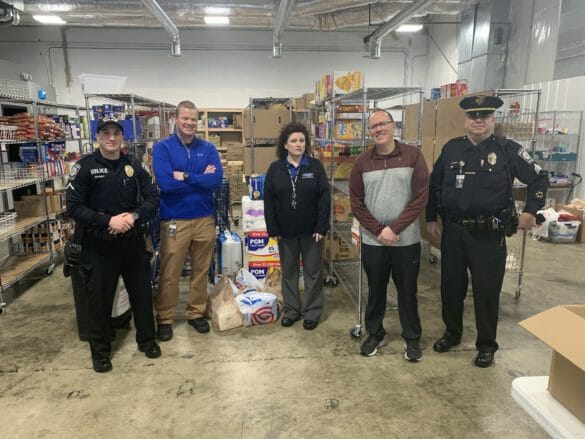 Police department dropping off donations to the food pantry