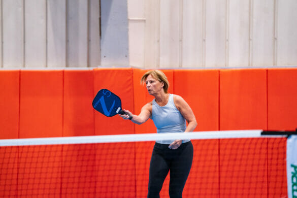 Woman playing pickleball