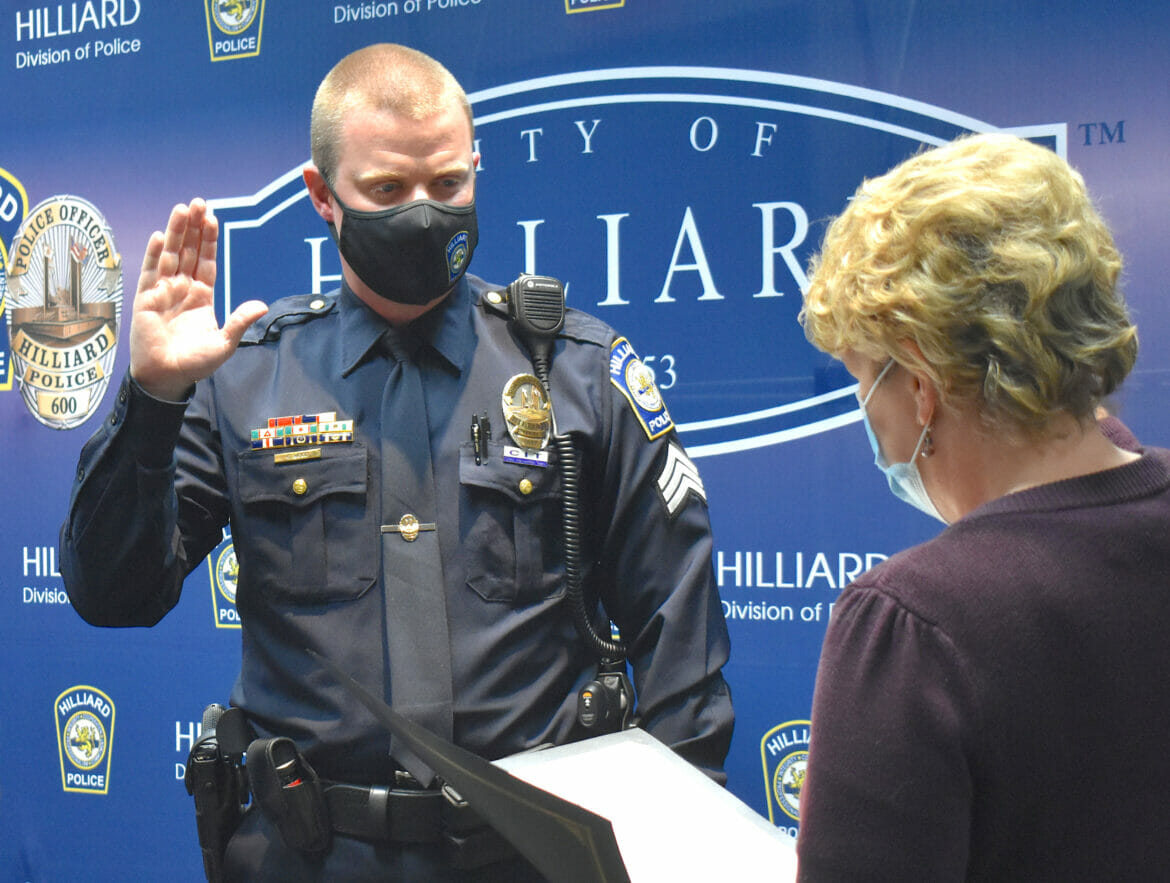 Sergeant Chad Wood being sworn in