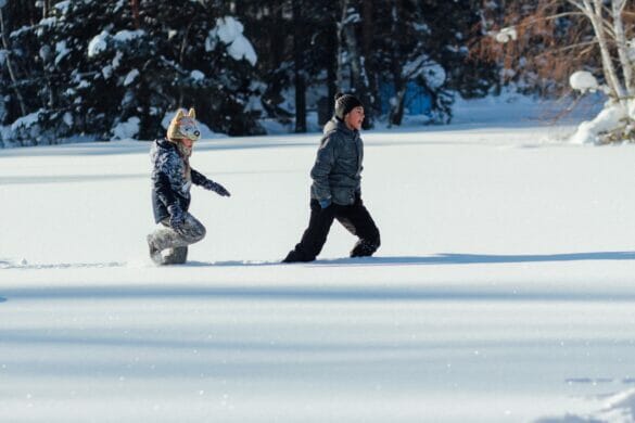 Kids walking through snow