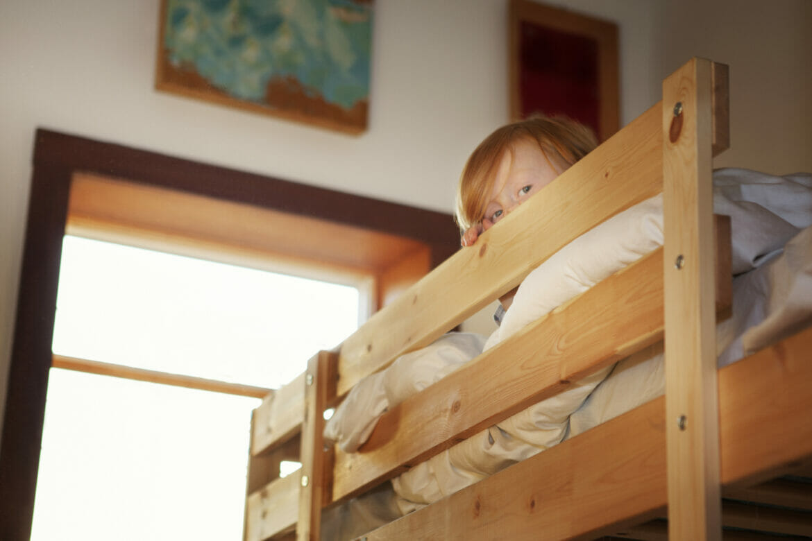 Portrait Of Boy On Bunked At Home