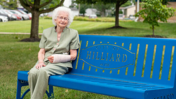 Marilyn Patton sitting on Hilliard bench