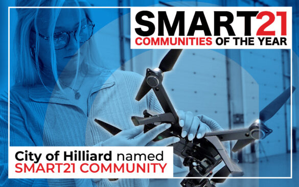 Woman holding a drone with the Smart 21 communities of the year logo