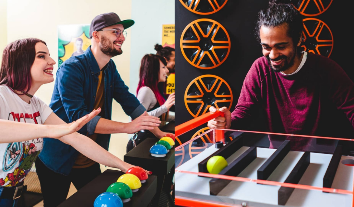 Group of friends playing interactive games at Gamer.