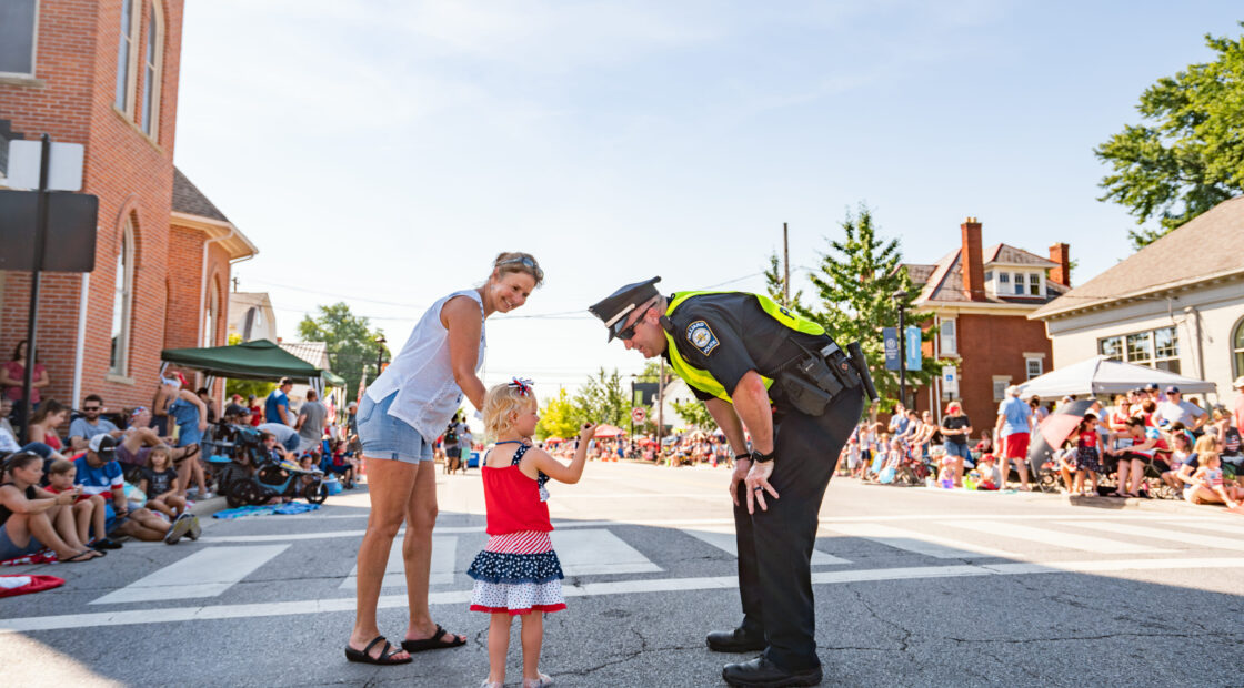 Little girl with police officer