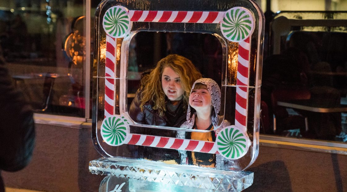 Mom and daughter posing