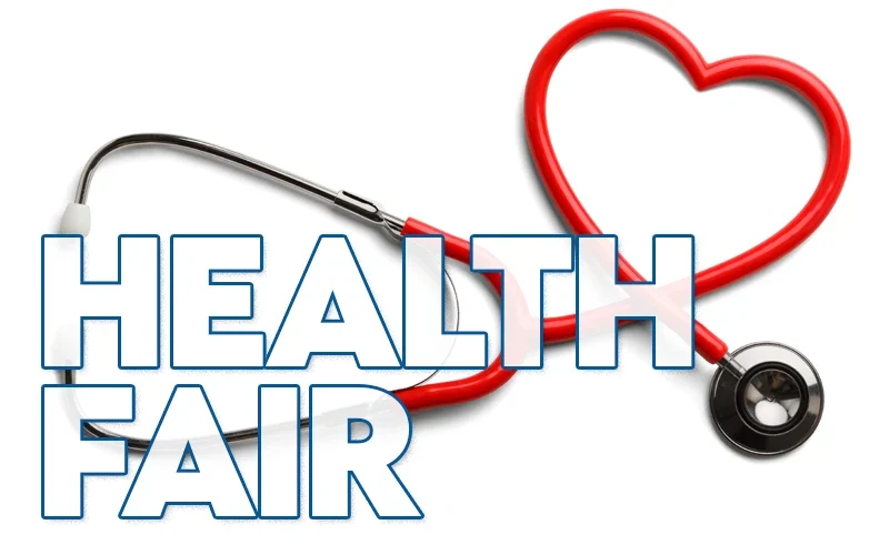 A stethoscope in a shape of a heart lays on a white background with the words Health Fair over it